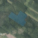 Ilmakuva Talvitienkorven metsätilasta Ilmajoen Huississa, rajaus merkitty sinisellä