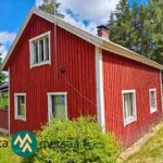Purkukuntoisen vuonna 1927 rakennetun punaisen omakotitalon julkisivu, Ikaalinen Vatula