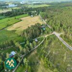Laaja ilmakuva Ikaalisten Vatulan maaseutumaisemasta, järvistä, pelloista ja metsistä